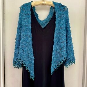 Teal blue hand knitted shawl